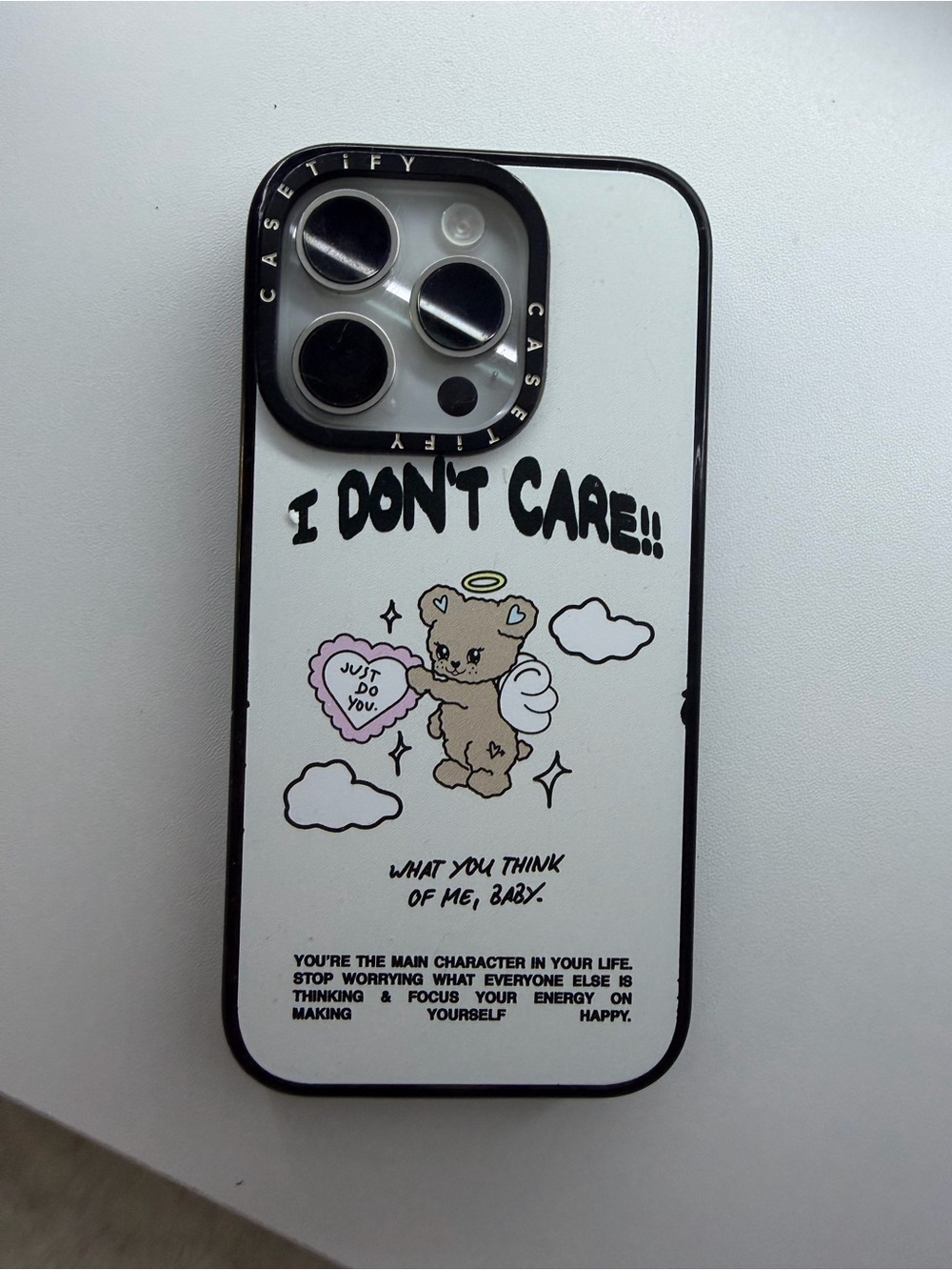 Casetify White Phone Case with 'I Don't Care' Bear Graphic and Pink Heart